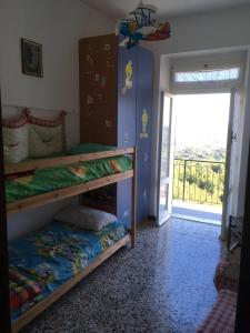 Postel nebo postele na pokoji v ubytování A cà du Baciccia