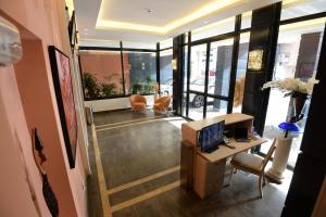 TV a/nebo společenská místnost v ubytování Nest 1 Hotel