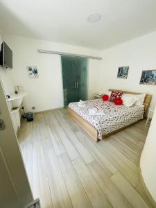 Voodi või voodid majutusasutuse Il Daviduccio Suite toas