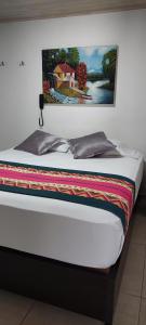 Кровать или кровати в номере Hotel La Castellana