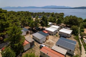 an aerial view of a group of buildings and trees at NEW !!! Adria Village Živogošće- camp Dole in Živogošće