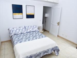 Voodi või voodid majutusasutuse APARTAMENTO PLAYA ALCARAVANERAS toas