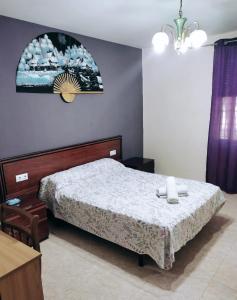 Postel nebo postele na pokoji v ubytování Habitación CID
