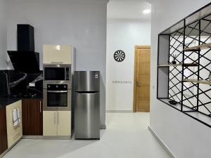 صورة لـ The Zen Loft - 2BR Open Plan Apt W/Pool+Smart Lock في ليكى