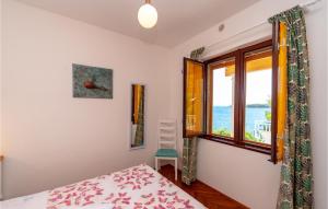 Postel nebo postele na pokoji v ubytování Holiday Home Prizba Bb