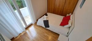 Łóżko lub łóżka w pokoju w obiekcie Appartement lumineux T3 avec jardin privatif à Hendaye - Parking et wif gratuit