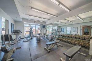 a gym with several treadmills and exercise bikes at OCEAN VIEWS 2b 2b CORNER UNIT WRAP AROUND BALCONY'S LB CONVENTION CENTER in Long Beach