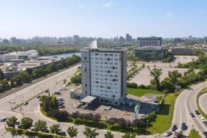 an aerial view of a building in a city at Holiday Inn Gatineau - Ottawa by IHG in Gatineau