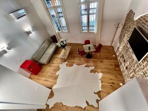 an aerial view of a living room with a map on the floor at La Finestra Sul Ghetto in Padova