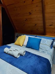 Uma cama ou camas num quarto em Cabanas Bouganville