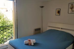 Katil atau katil-katil dalam bilik di Beautiful Apartment 32 M In The Center Of Aix