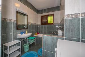 Kúpeľňa v ubytovaní Apartments Jarmila