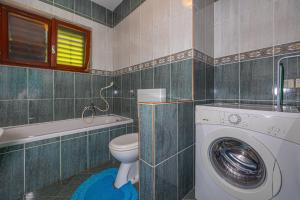Kúpeľňa v ubytovaní Apartments Jarmila