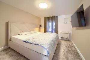 Postel nebo postele na pokoji v ubytování Apartment Siora