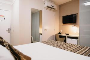 Cama ou camas em um quarto em Lagoon Prime Hotel