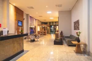 Uma área de estar em Lagoon Prime Hotel mais 37 fotos