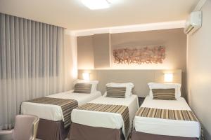 Uma área de estar em Lagoon Prime Hotel