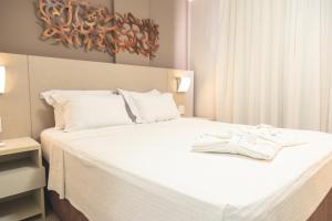 Cama ou camas em um quarto em Lagoon Prime Hotel