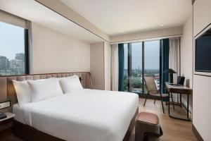 Sayarsan Hotel Yangon客房内的一张或多张床位
