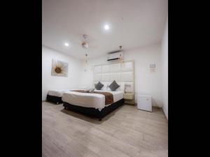Llit o llits en una habitació de Room in Lodge - Hotel San Andres Isla Colombia