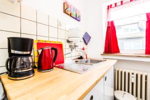 O bucătărie sau chicinetă la CGN Apartments - Altstadt süd