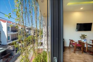 TV a/nebo společenská místnost v ubytování Nam Hội Homestay
