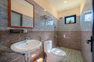 Koupelna v ubytování Nam Hội Homestay + 11 fotografií