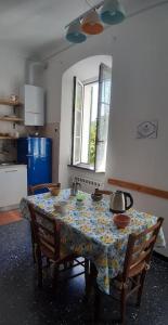 A kitchen or kitchenette at Le ortensie di Villa Vittoria nel verde a pochi minuti di auto dalle spiagge