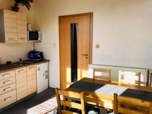 Kuchyň nebo kuchyňský kout v ubytování Apartmány Vranov