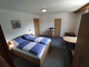 Postel nebo postele na pokoji v ubytování Apartmány Vranov