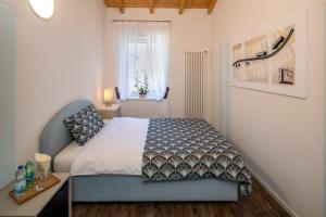 Rúm í herbergi á Albergo Ristorante Stazione Balerna