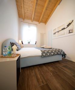 Rúm í herbergi á Albergo Ristorante Stazione Balerna