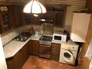 Kuchyňa alebo kuchynka v ubytovaní Guest House Arnika