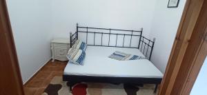 Llit o llits en una habitació de Apartament in Corbu in casa de vacanta