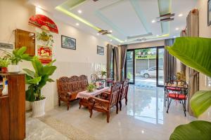 Posezení v ubytování Nam Hội Homestay