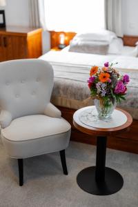 Postel nebo postele na pokoji v ubytování Kotnik Superior Boutique Hotel