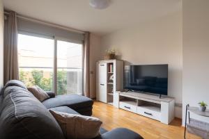 TV/Unterhaltungsangebot in der Unterkunft Apartamento Bulevar 1 con parking gratuito