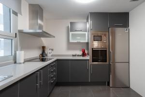 Küche/Küchenzeile in der Unterkunft Apartamento Bulevar 1 con parking gratuito
