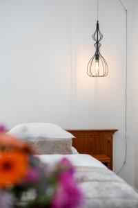 Postel nebo postele na pokoji v ubytování Kotnik Superior Boutique Hotel