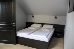 Postel nebo postele na pokoji v ubytování Astoria Hotel & Restaurant