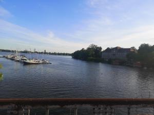 a view of a river with boats docked at Ferienwohnung Bensdorf in Bensdorf