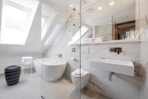 Koupelna v ubytování Kotnik Superior Boutique Hotel