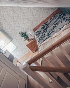 an overhead view of a bedroom with a bunk bed at Tamula loftid in Võru