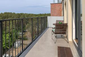 A balcony or terrace at Na Wydmach Sea View by Renters Prestige