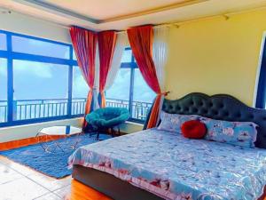 Giường trong phòng chung tại Sun Villa Tam Đảo