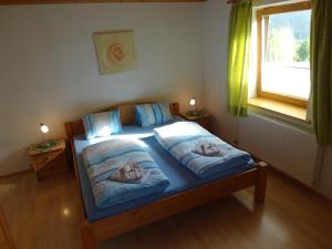 Postel nebo postele na pokoji v ubytování Gästehaus Posch