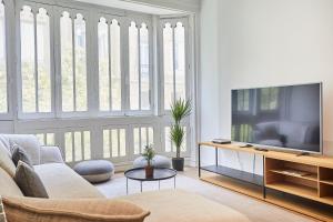 Televízia a/alebo spoločenská miestnosť v ubytovaní Getaria by Basque Homes