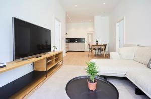 Televízia a/alebo spoločenská miestnosť v ubytovaní Getaria by Basque Homes