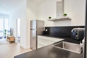 Kuchyňa alebo kuchynka v ubytovaní Getaria by Basque Homes
