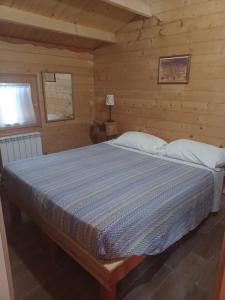 Postel nebo postele na pokoji v ubytování Agriturismo Cisogna + 37 fotografií